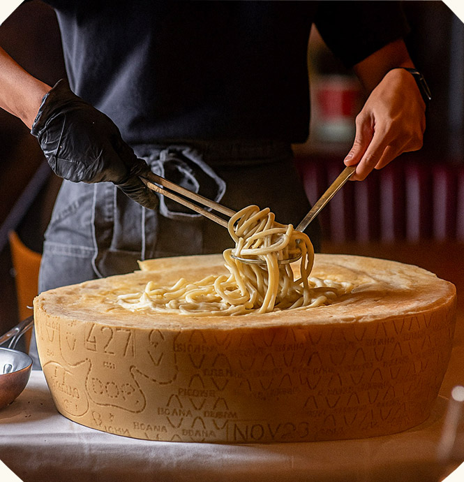 Whole Parmigiano cheese wheel at LIVIN'Italy